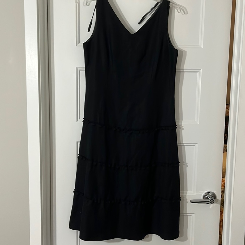 Fun, cute black dress.  Great for casual or dress.